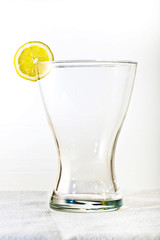 Slice of lemon at the top of the glass
