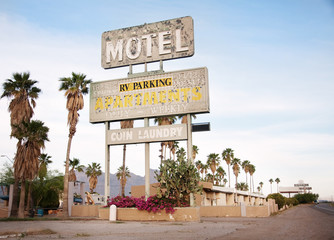 An old sign over old motel in Arizona, USA - Powered by Adobe