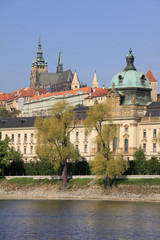 Fototapeta na wymiar The View on spring Prague's gothic Castle above River Vltava
