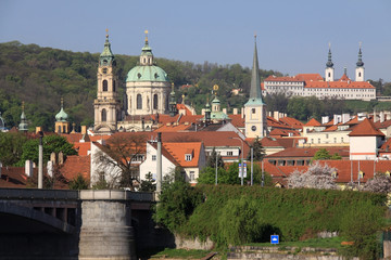 Obraz premium The View on spring Prague's St. Nicholas' Cathedral