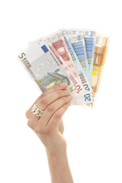 Hand is holding euro money over white background