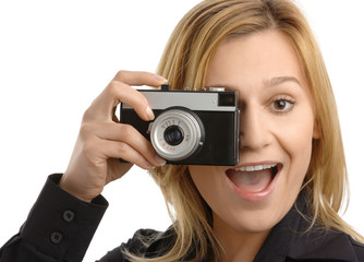 young woman taking a shot with photo camera