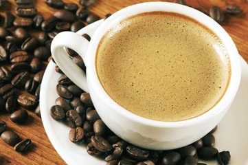 Coffee beans and cup