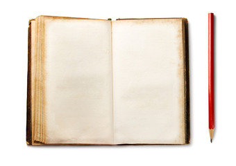 Old book with pencil isolated on white