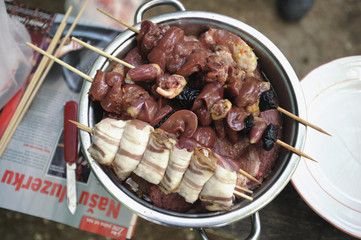 meat waiting to be cooked on barbecue