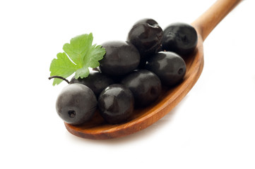 black olives in the spoon