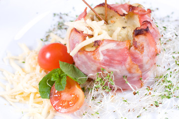 Baked potatoes with bacon and cheese