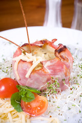 Baked potatoes with bacon and cheese