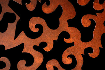 Rusty iron decorative pattern. Vintage metalwork detail.