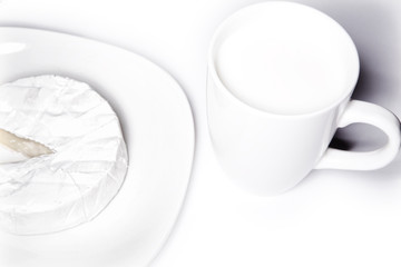 Cup of milk and cottage cheese.