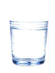 glass of mineral water on white background