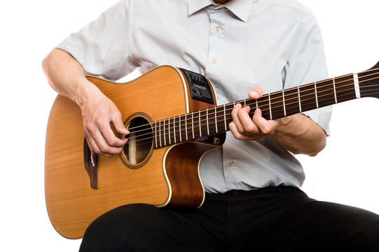 man plays guitar