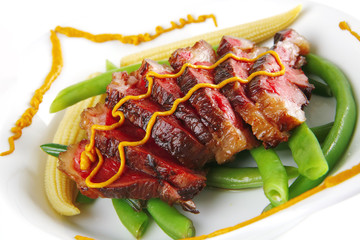 beef meat served with mustard