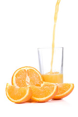 orange slices and half juice in glass