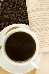 Caffeine Drink & Newspaper