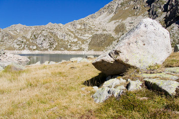 Big stone and lake in background - Aiguestortes National Park