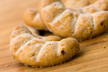 Delicious sweet Biscuits on the wooden Background.