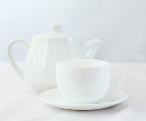 White tea pot and cup