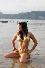 Beautiful young woman in a bikini.