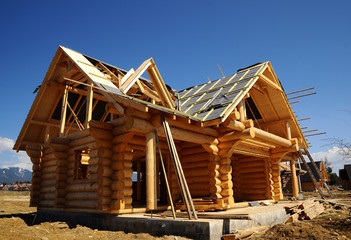 Fototapeta na wymiar Drewniane domy na etapie budowy