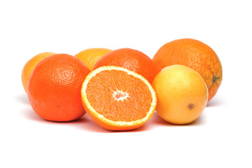 Oranges and lemons isolated on white background