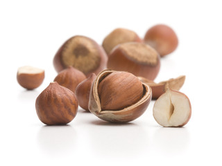 Heap of hazelnuts isolated on a white