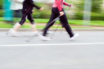 Nordic walking race, motion blur