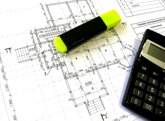 construction drawings, felt-tip pen and calculator