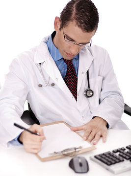 Young physician write down notes