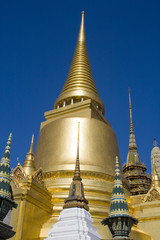 Fototapeta premium Golden stupa in the Grand palace area in Bangkok, Thailand