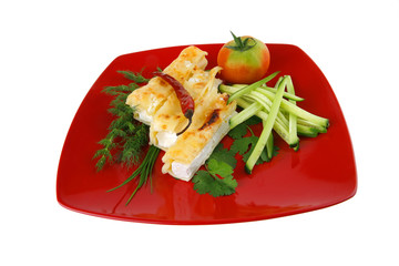 cheese cannelloni on red plate
