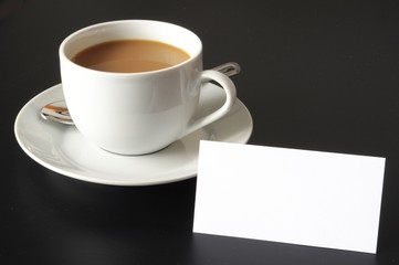 Obraz na płótnie Canvas cup of coffee and paper copyspace