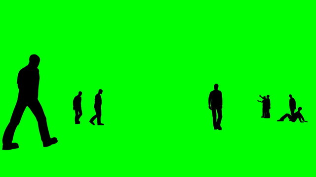 Silhouettes talking together against a green background