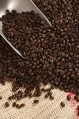 Coffee beans, scoop and sack