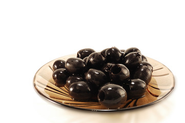Black olives in a bowl.