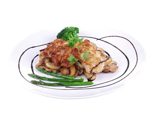 fried fish with vegetables isolated on white background