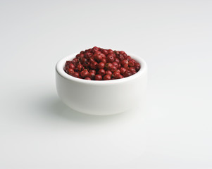 Pink Peppercorns In White Dish