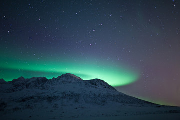 Aurora Borealis over mountains