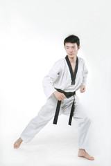 asian man playing with taekwondo