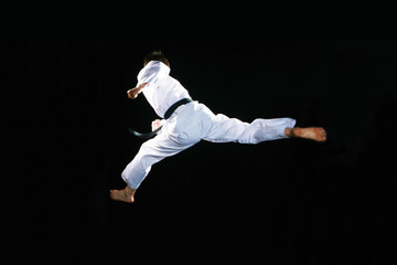 Fototapeta na wymiar one asian man is playing with taekwondo