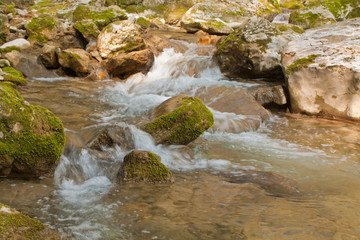Naklejka na ściany i meble Waterfall with stones