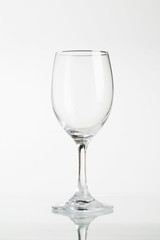 Empty wine glass isolated on white background ..