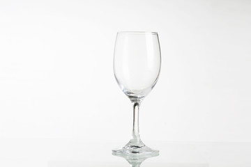 Empty wine glass isolated on white background ..