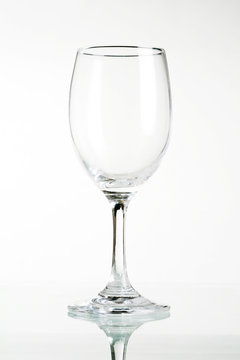 Empty wine glass isolated on white background ..