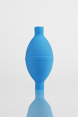 A blue plastic containers on the table