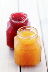 Fototapeta na wymiar orange and raspberry jam