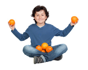 Funny child with many oranges