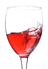 splash in glass with red wine