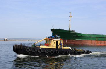 two boats arriving to port