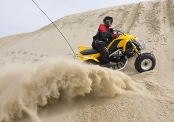 ATV rider spraying sand © Raven